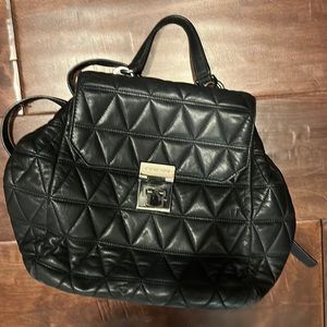 Gently used Michael Kors Quilted backpack